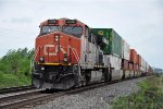 Eastbound intermodal slows for a meet